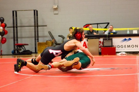 Wrestlers Battle One-on-One as They Try to Get to State