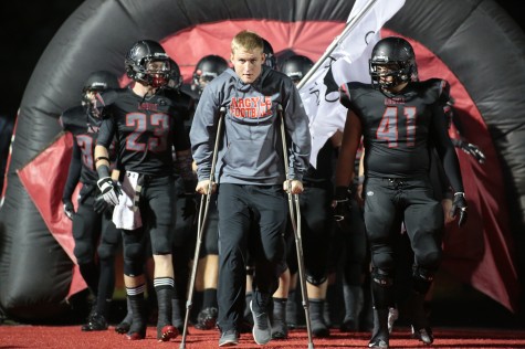 Senior Sam Sizelove Leads Team out at last District Home Game Against Celina