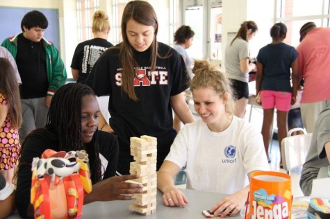 Basketball Team Volunteers During Summer to Help Those in Need