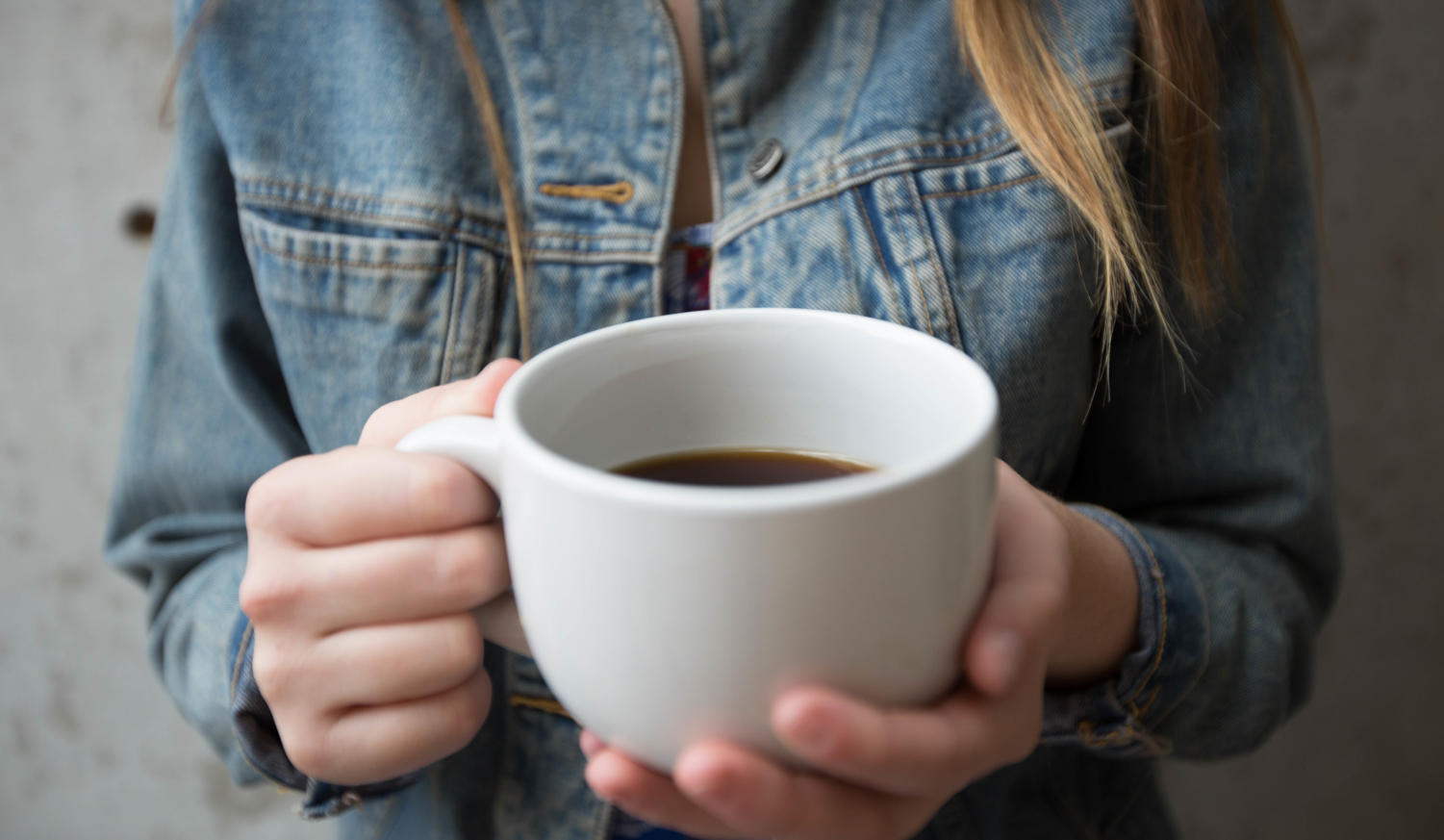 Ashlynn Roberts enjoys a hot cup of coffee on a chilly fall day in Argyle, Texas on October 5, 2018 (Jaclyn Harris/ The Talon News)