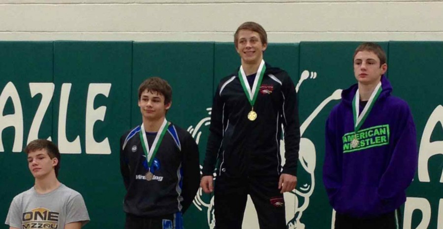 Tanner+Kuketz%2C+Cutler+McMartin+and+Chase+Roth+show+off+their+district+medals+at+Azle+on+Feb.+1%2C+2013.++
