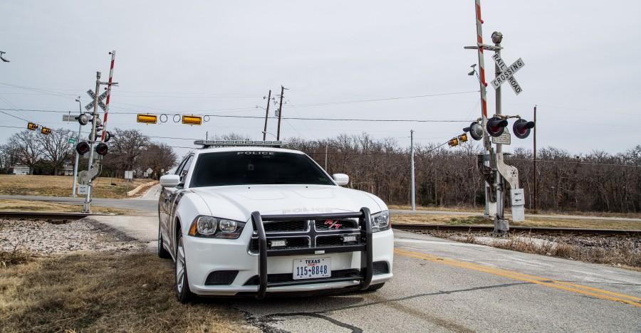 Argyle ISD Chief Ralph Prices police cruiser sits in front of the railroad crossing located at 377 and Harpole Rd. on Feb. 5, 2014, across from the corner of the Argyle HS campus.  Photo by Matt Garnett.