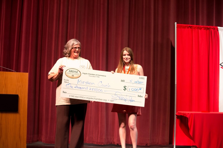 Argyle senior, Kirsten Couch, receives her $1,000 scholarship from the Chamber of Commerce