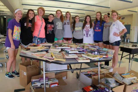Girls basketball members of both middle and high school came together on June 18th to help a school in need. 