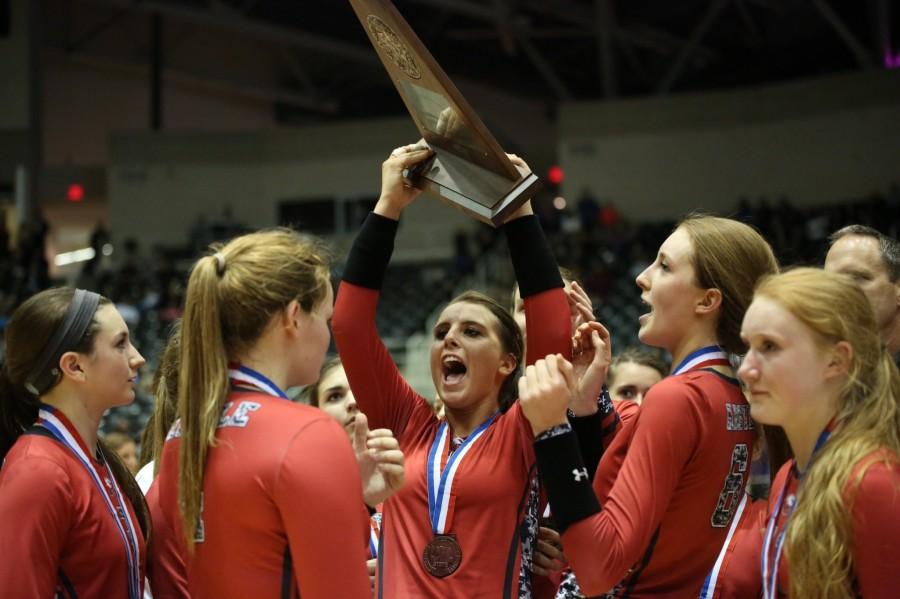 Junior Eighmy Dobbins cheers with her teammates over their 2nd place win at state against Liberty Hill at Curtis Culwell Center Nov. 21, 2014 in Garland, TX. ( Annabel Thorpe / The Talon News)