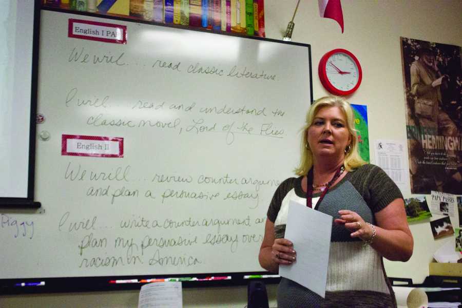 English teacher, Terra Lyon, teaches for the class under the new Fundamental Five teaching plan. ( Evan Welsh/ The Talon News)