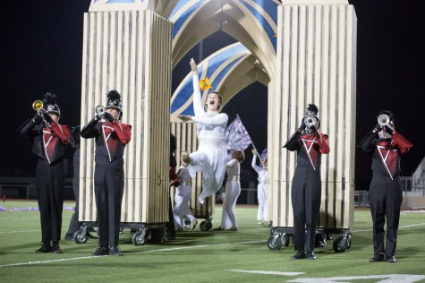 Color guard member Hannah Wildeveld performs during the Lakeworth football game at Pioneer Stadium in Saginaw, Texas on Nov. 14, 2014. (Annabel Thorpe / The Talon News)