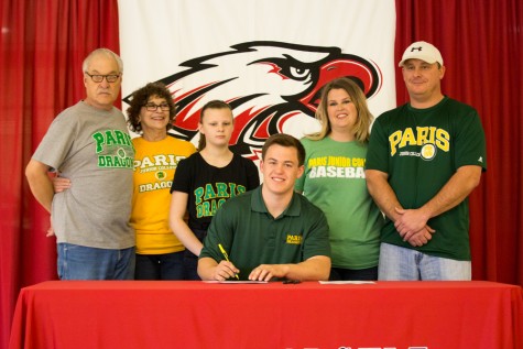 Cutter McDonald signs to Paris Junior College on National Signing Day at Argyle High School on Feb. 4, 2015. (Photo by Caleb Miles / The Talon News)