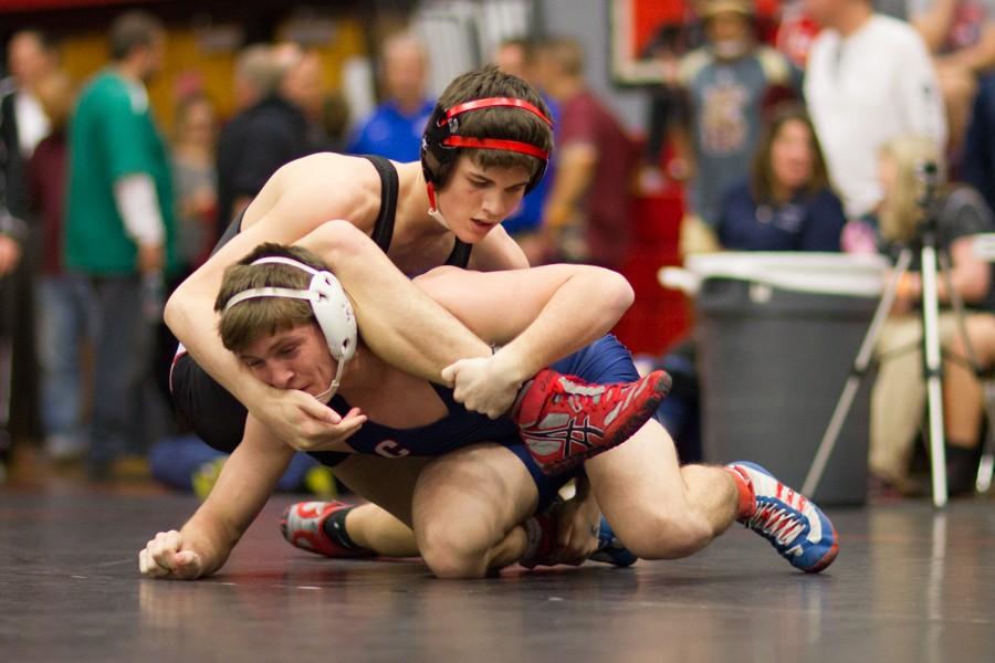 Chase+Roth+defeats+his+opponent+in+the+regional+wrestling+match+on+March+13%2C+2015+%28Erin+Eubanks+%2F+The+Talon+News%29