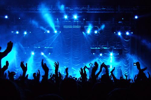 Many fans get pumped at summer concerts during their time away from the school desk. (Creative Commons)
