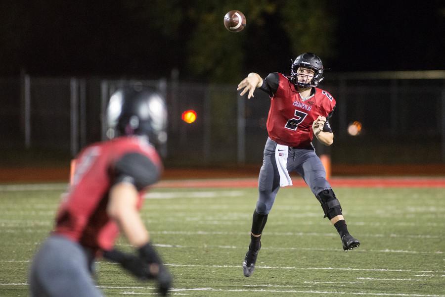 Dane Ledford (2) throws the ball to Drew Estrada (3) in the Eagles 2015 Homecoming game against Dallas Carter on Oct. 23, 2015 in Argyle, Texas. (Christopher Piel/The Talon News)