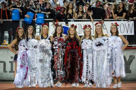 Argyle cheerleaders show off their mums at the Homecoming football game at Argyle High School in Argyle, Texas on Oct. 17, 2014. (Annabel Thorpe / The Talon News)