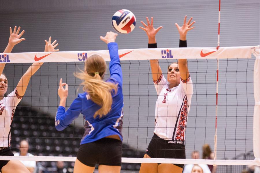 Senior Eighmy Dobbins blocked the spike from Robinson in the UIL State semifinal game on Thursday, Nov. 19 at Curtis Culwell Center in Garland, TX. (Caleb Miles / The Talon News)