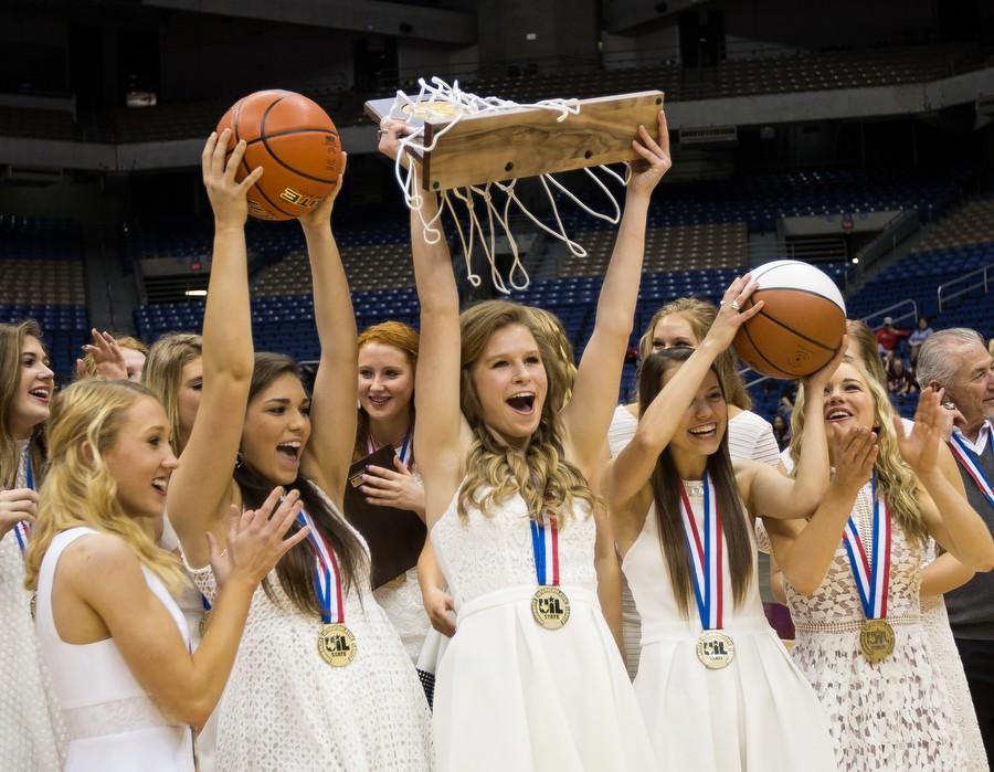 The Lady Eagles celebrate their new hardware again after their win against Waco La Vega in the UIL State Basketball Finals at the Alamodome in San Antonio, Texas on March 5, 2016. (Photo by Annabel Thorpe)
