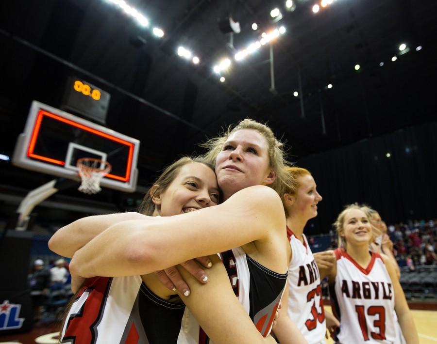 Seniors Olivia Gray and Kaylie King embrace their win over Liberty Hill 43-32 at the UIL State Basketball Semi-finals at Alamodome in San Antonio, TX on March 4, 2016. (Annabel Thorpe / The Talon News)