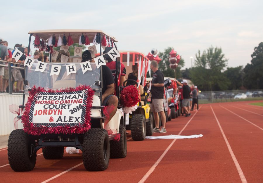 Golf carts replace floats and the old parade tradition for the Ring of Champions, Argyles newest event. From homecoming celebrations, students walk the field before community members. (Annabel Thorpe/The Talon News)