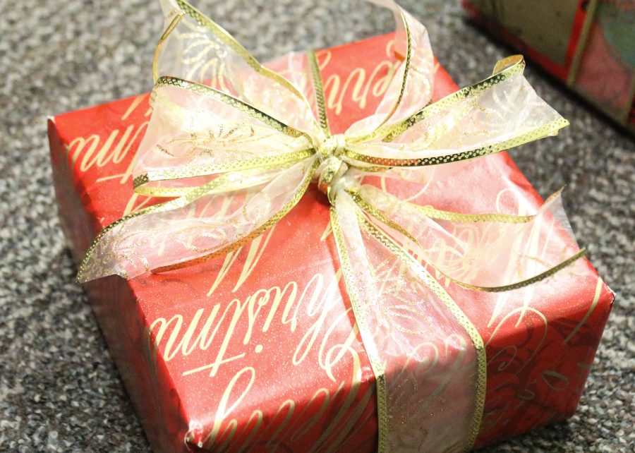 A wrapped present with a bow on top sits on the ground  at Argyle High School on December 13, 2016 in Argyle, Texas. (Faith Stapleton/ The Talon News)