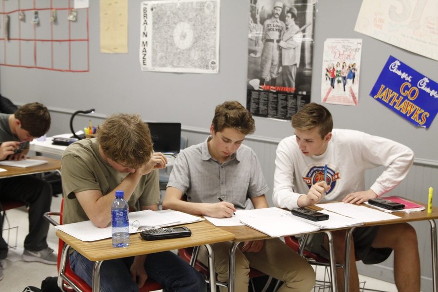 Scott Gay, Daylen Riley, and Maxwell Valentio (left to right) participate in Russell Perkins sophomore Algebra II class on Jan. 11, 2017 at Argyle High School in Argyle, Texas. (Elli Marusa / The Talon News) 