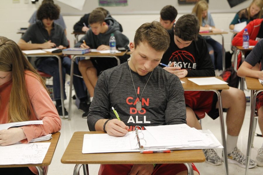 Sophomore Chase Petter works independently in Russell Perkins tenth grade Algebra II class on Jan. 11, 2017 at Argyle High School in Argyle, Texas. (Elli Marusa / The Talon News)