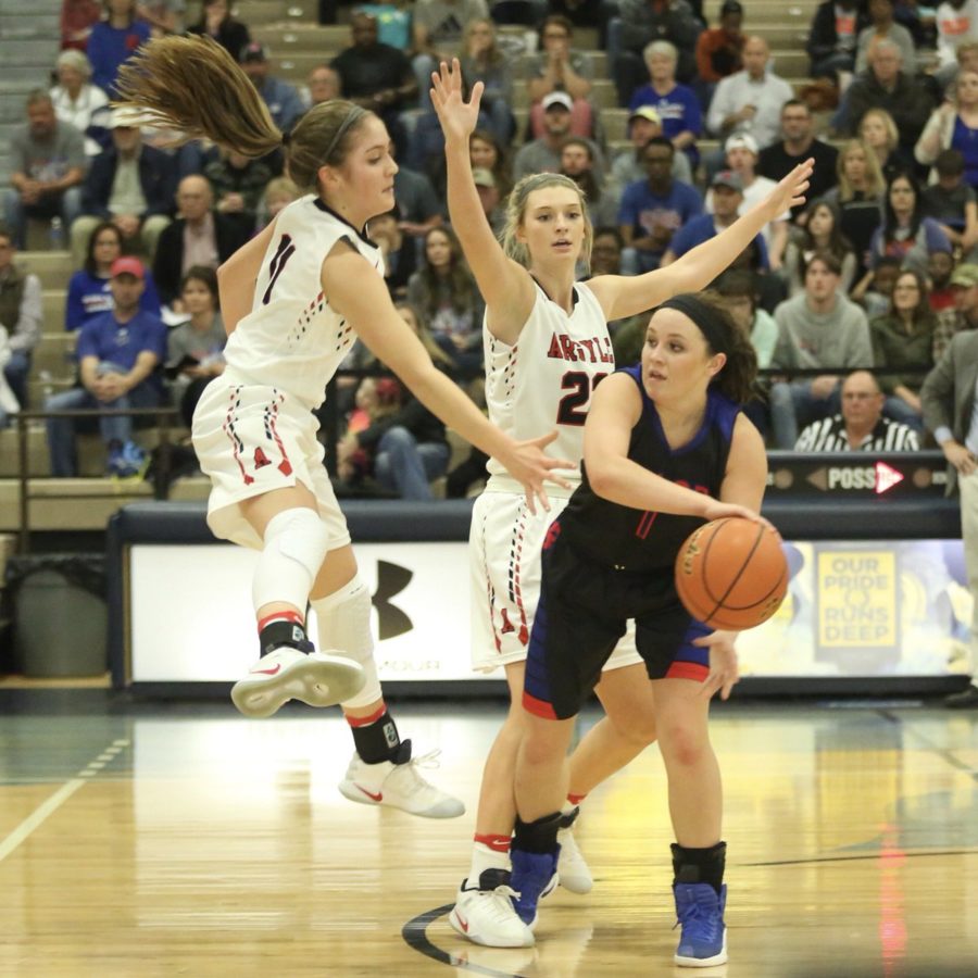 Brooklyn Carl and Madison Ralston block out a Bullard opponent in the Region semifinal game vs the Bullard Panthers at The Fieldhouse, Texas A&M University, Commerce, TX on Feb. 24, 2017 (Caleb Miles/ The Talon News)