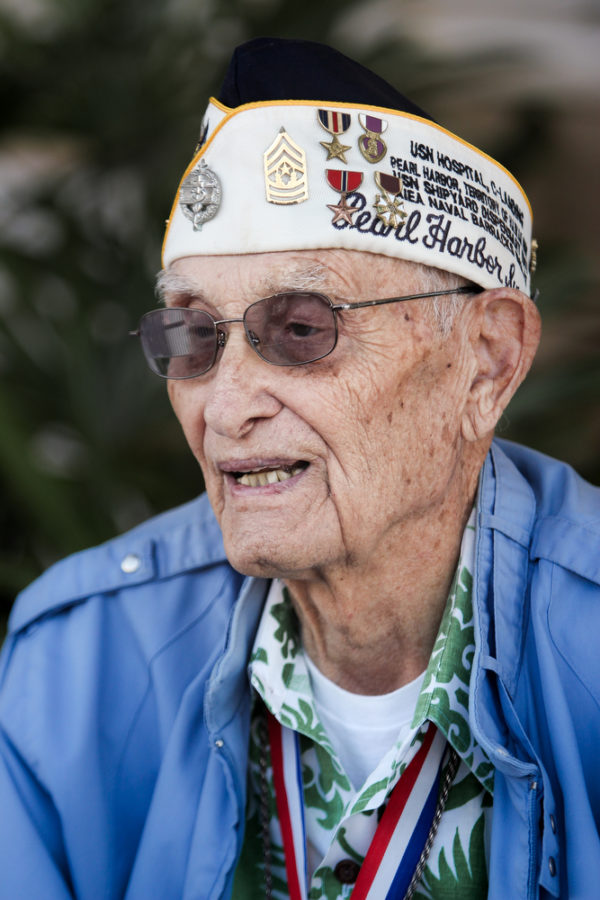 Sterling Cale, a Navy veteran who help pull bodies from the waters of Pearl Harbor on Dec. 7, 1941, shares his story at the Pearl Harbor Visitors Center on Feb. 18. in Maui, Hawai. (Quinn Calendine  / The Talon News)