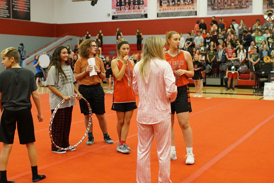 The pep squad leads students in a challenge at the senior pep rally in Argyle, Texas on Nov. 3, 2017. (Stacy Short / The Talon News)