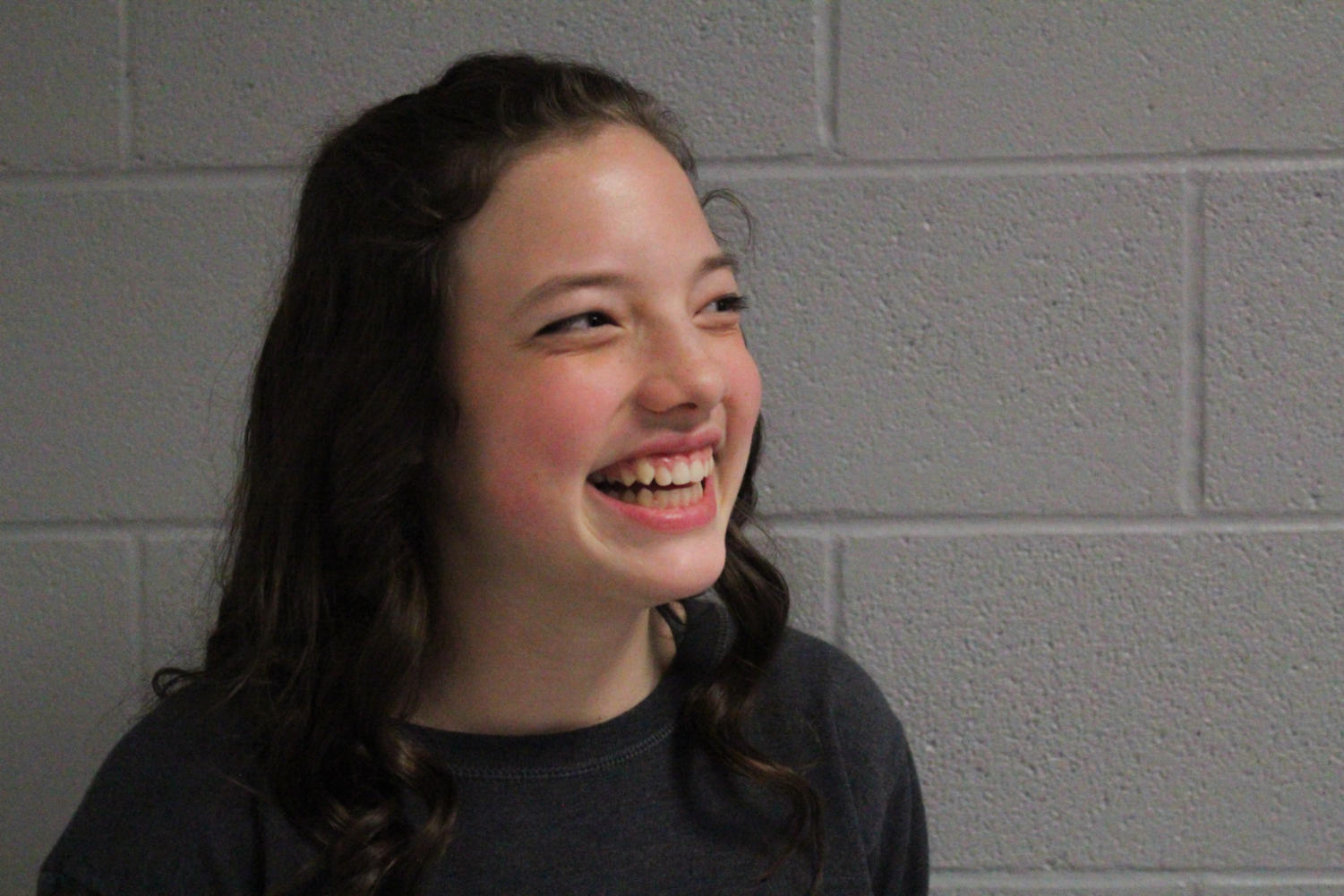 Freshman Peyton Deffenbaugh explains her love for music and singing at Argyle High School on Dec. 6, 2017. (Hayden Calendine / The Talon News)