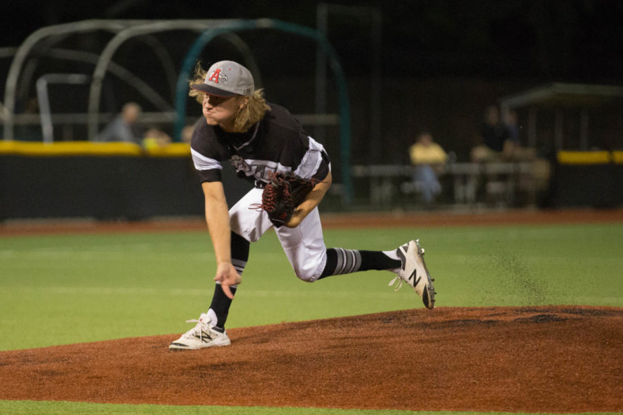 Senior Parker Abrego pitches at the game vs. Pleasant Grove on April 24, 2017 in Tyler, Texas. (GiGi Robertson / The Talon News)