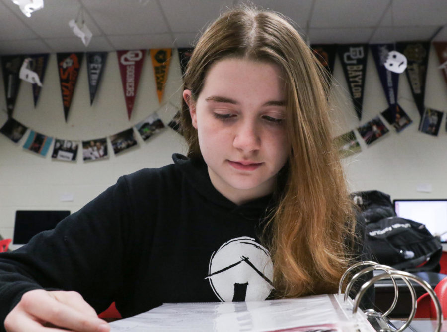 A freshman works diligently in English, on January 24, 2018. (Hayden Calendine | The Talon News)