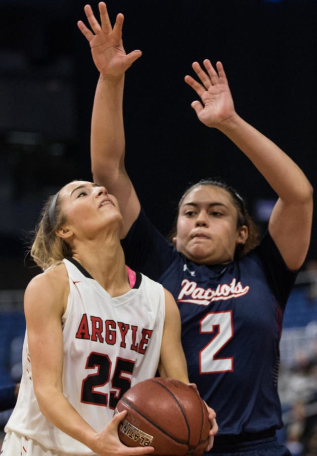 Freshman Sydney Standifer makes a layup for the Lady Eagles as they take on Veterans memorial in the UIL State Championship game.  (Campbell Wilmot (Campbell Wilmot/ The Talon News)