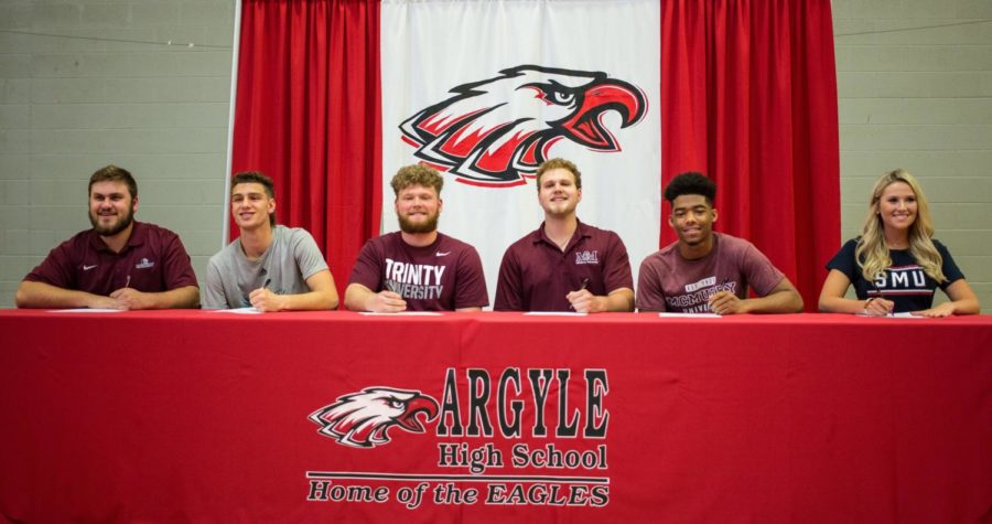 Athletes+sign+to+play+sports+at+their+colleges+on+signing+day+at+Argyle+High+School+in+Argyle%2C+Texas+on+April+24%2C+2018.+%28Campbell+Wilmot+%2F+The+Talon+News%29