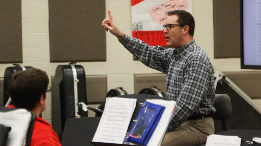 Golden Eagle, Asa Burk, directs the Symphonic Band in preparation for the Spring Concert on April 29, 2018 in Argyle, Tx. (Katie Ray / The Talon News)