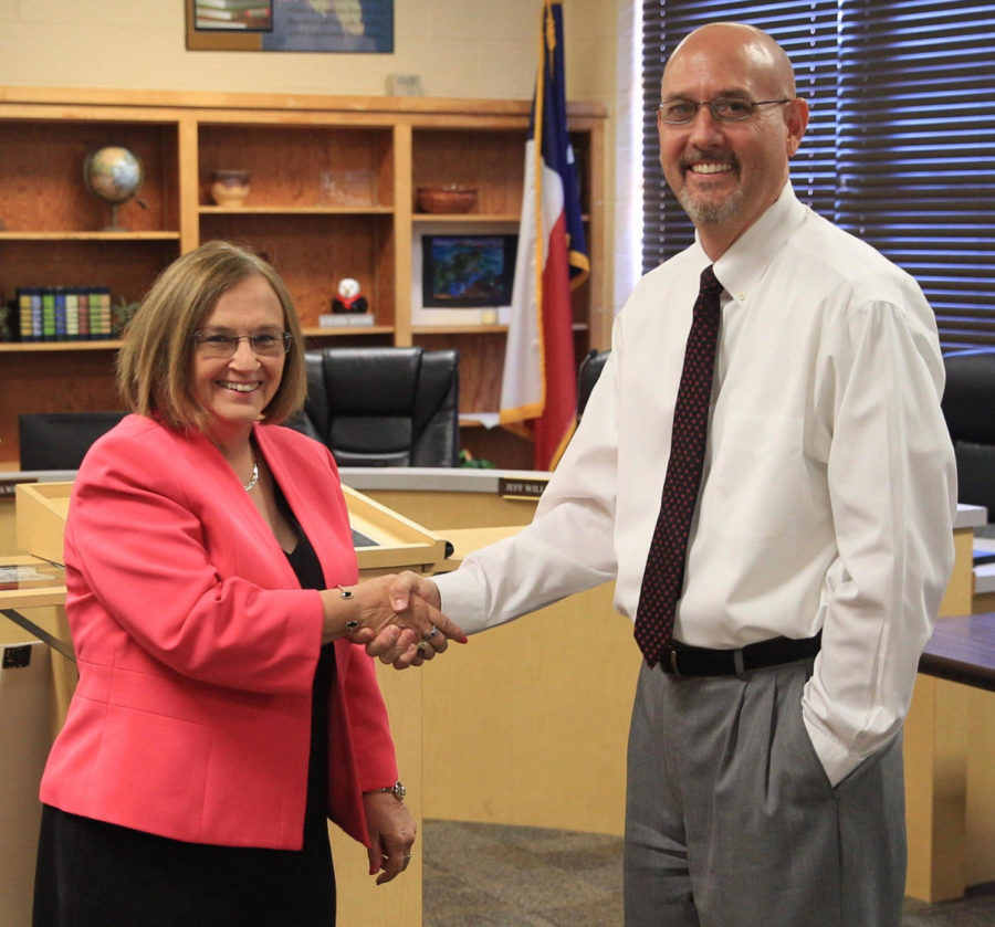 Superintendant Dr. Wright and Mr. King celebrate his announcement as new principal.
