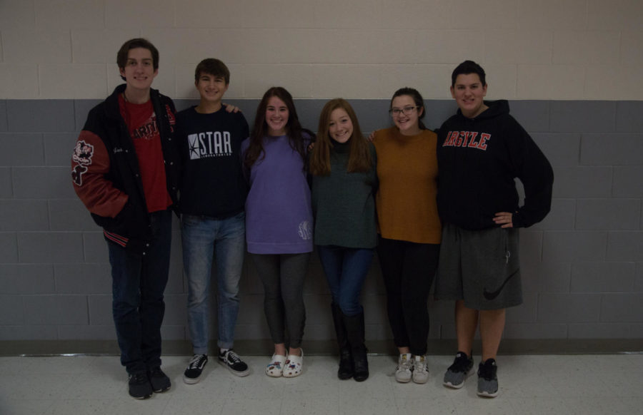 Pictured from left to right are the All State Choir Students: Jackson Barnes, Wade Paquin, Sarahbeth Meraz, Bella Zindel, Kassidy Rosengren and Payton Connatser (not pictured are Grady Henexson and Austin Rusk) at Argyle High School in Argyle, Texas, on Dec. 17, 2018. (Ashlynn Roberts  / The Talon News)