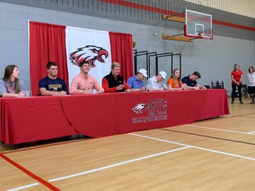 Eight seniors sign to their future colleges, on National Signing Day, on Wednesday, February 6.
