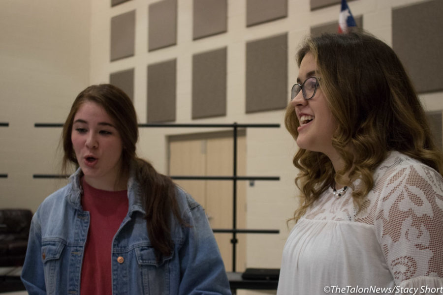Members of Remedy sing at Argyle High School in Argyle, Texas.