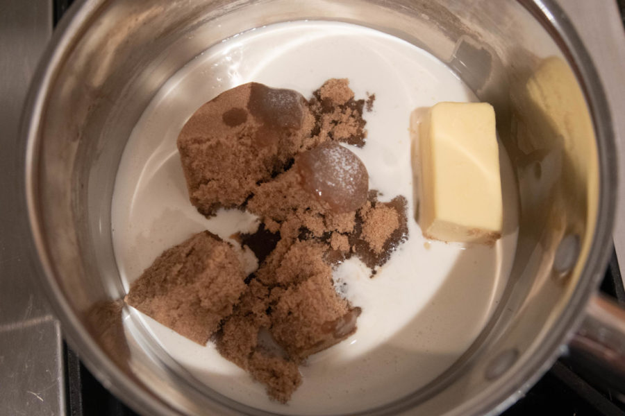 While the macarons were resting, we began to make a simple caramel sauce by combining brown sugar, vanilla, heavy cream and butter in a saucepan over medium heat. (Ashlynn Roberts/ The Talon News) 