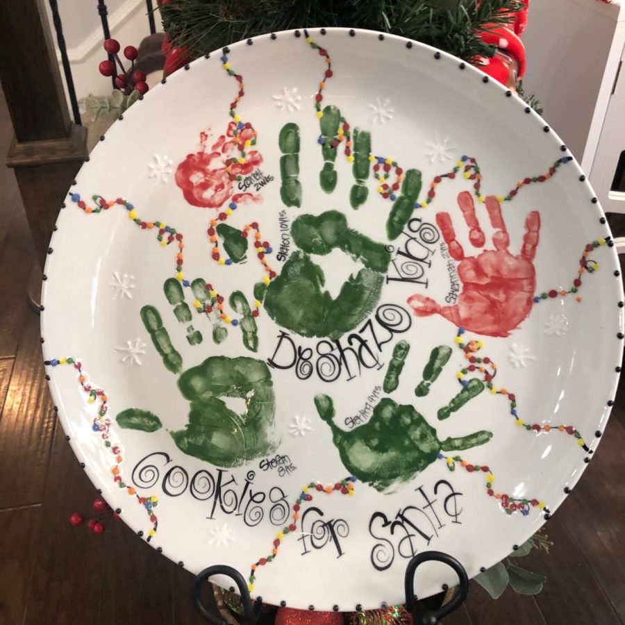 Whenever we were all really young, we all had to put paint on our hands and we placed them on a plate, Savannah Deshazo said. So every year we put out the Christmas hands plate. We put our cookies for Santa on it and that’s our funny tradition. (Photo courtesy of Savannah Deshazo)