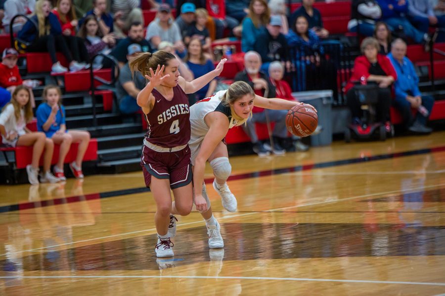 Senior Brooklyn Carl breaks away from the defender during the game against the Bridgeport Sissies on Jan. 10, 2020. (Alex Daggett / The Talon News)