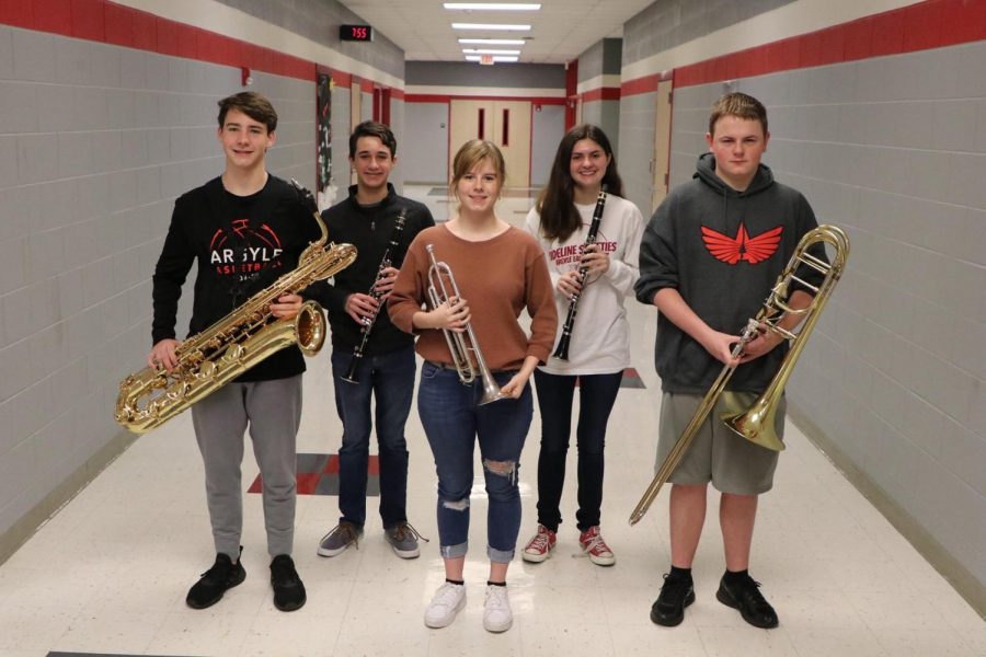 Band+students+Micah+Splain%2C+Zach+Tait%2C+Karter+Hennigan%2C+Trinity+Flaten%2C+and+Preston+Rushford+progress+to+state+band.+%28Photo+courtesy+of+Pam+Arrington%29