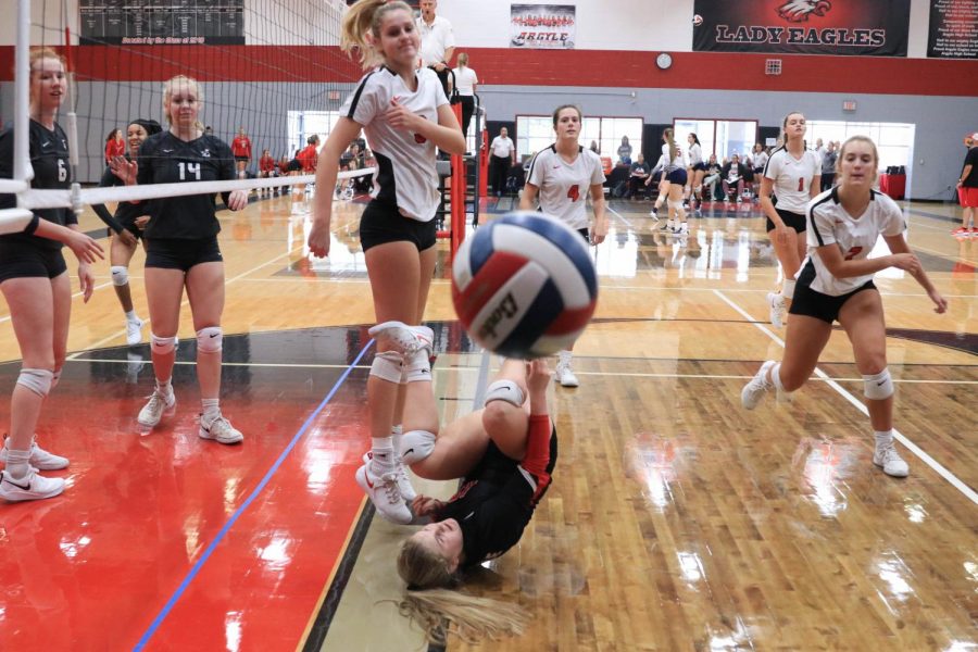 Sophomore Jada Price dives for the ball during the Sawyer Camillo Memorial Tournament at Argyle High School in Argyle, Texas on Aug. 23, 2019. (Jaclyn Harris | The Talon News) 
