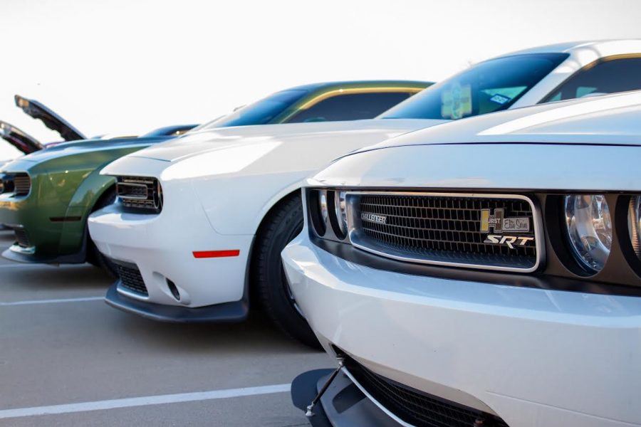 Lineup of three beautiful Dodge Challengers at Dallas Fueled Up Car Meet. (Jacob Lormand I The Talon News)