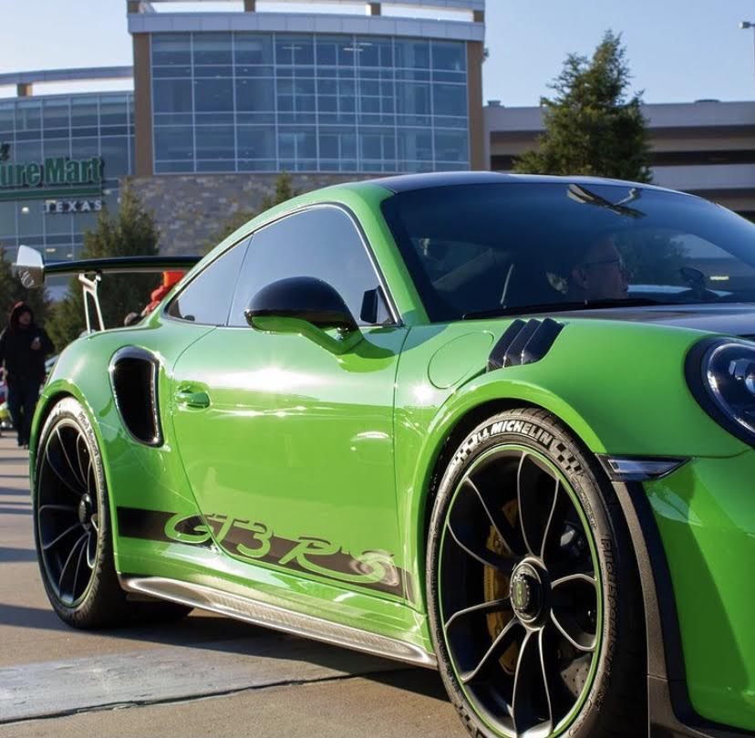 A sweet looking Porsche 911 GT3 RS making its way around the Dallas Fueled Up Car Meet. (Jacob Lormand I The Talon News)
