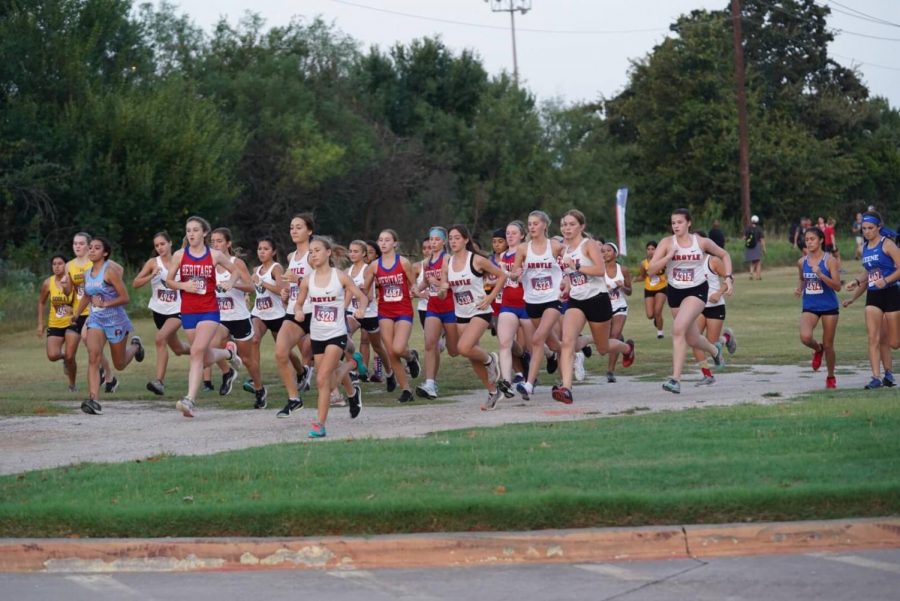 The Lady Eagles Varsity Cross Country team starts off strong at the Kennedale Invitational on Saturday, August 20th. (Natalie Long)
