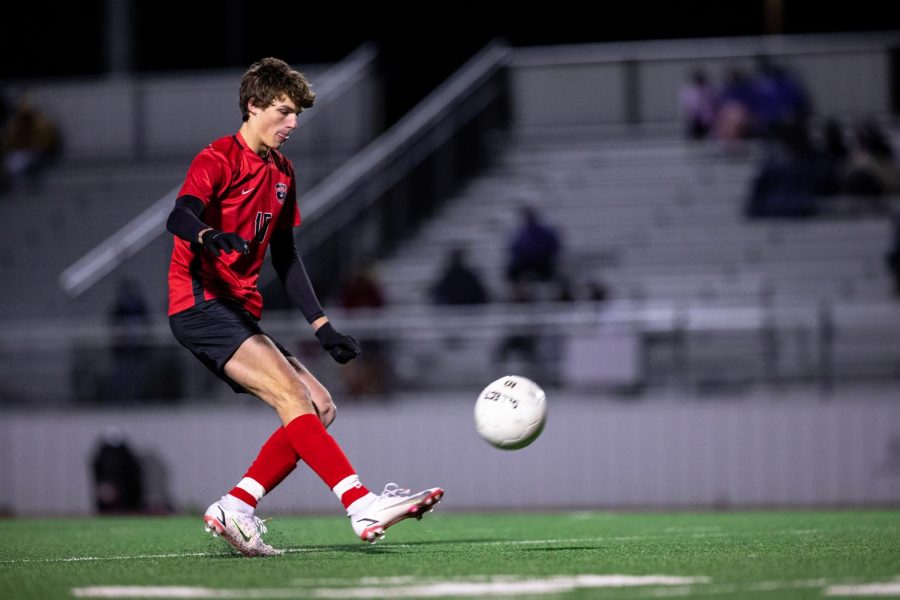 Argyle High School soccer player shoots the ball in a game against Decatur High School.