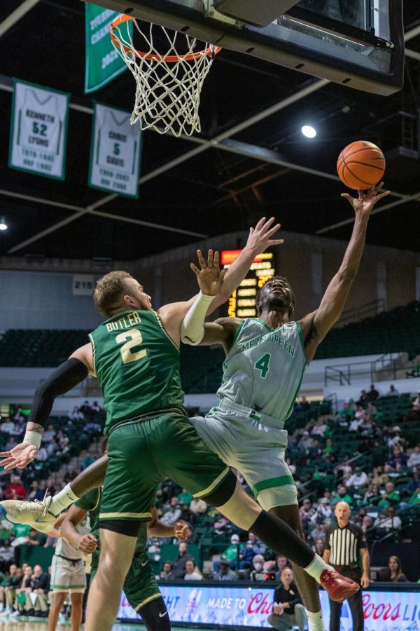 Thomas Bell reaches high for the ball to get the rebound at the Super Pit in Denton, Texas on Jan. 20, 2022.