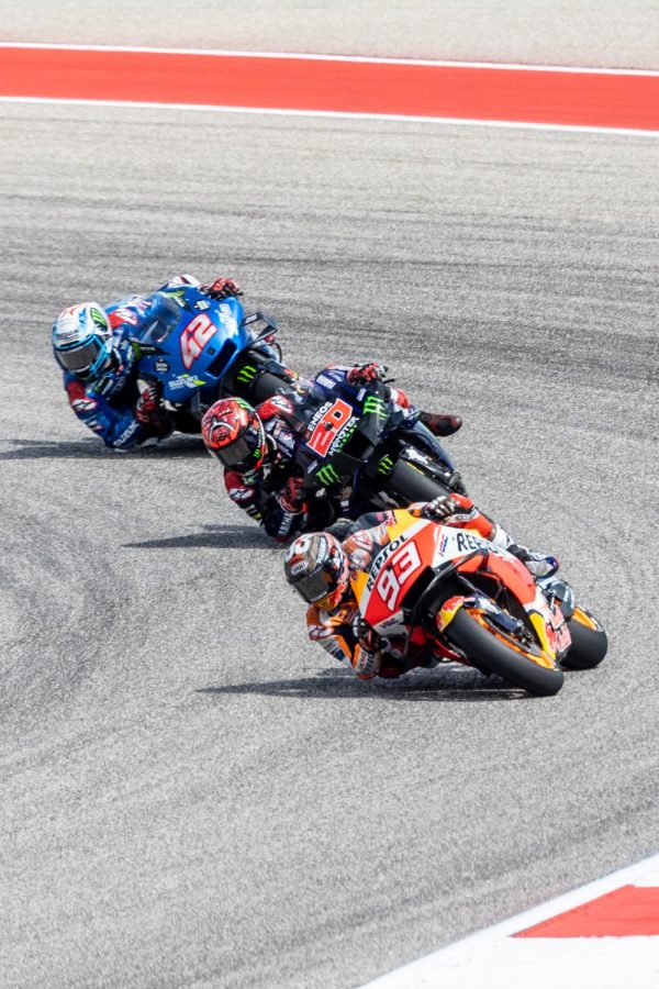 A group of riders clip the ground on turn 14 at The Circuit of the Americas on Oct. 3, 2021.