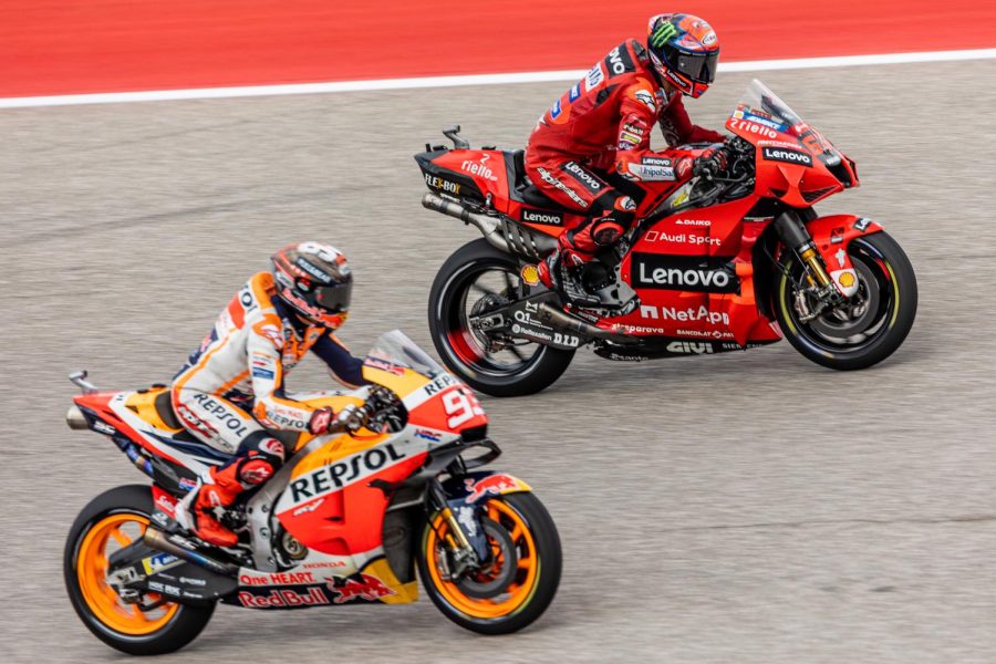 Marc Márquez goes neck and neck with Francisco Bagnaia during the final stretch of the race at The Circuit of the Americas on Oct. 3, 2021.