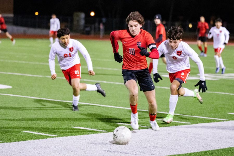 At the Argyle High School stadium, senior Connor Webster dribbles the ball on January 25.