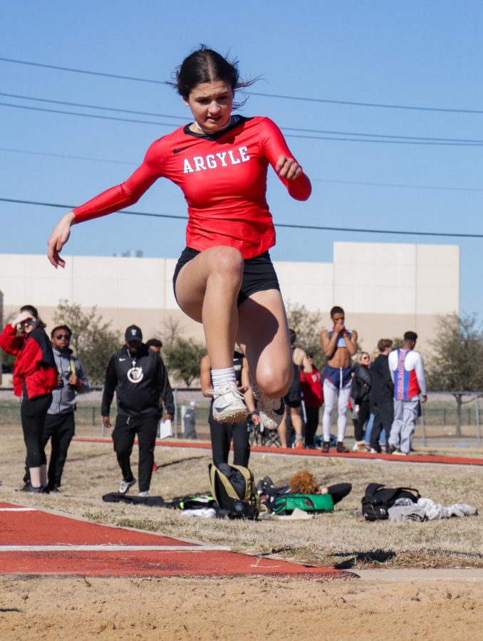 KK Combs competes in track and feild on February 18, 2022 at Grapevine, Texas.